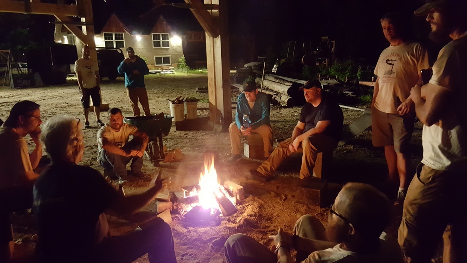 The end of the Spring 2017 Fox Maple Traditional Timber Framing Workshops, with the camp fire under the frame the students had built.